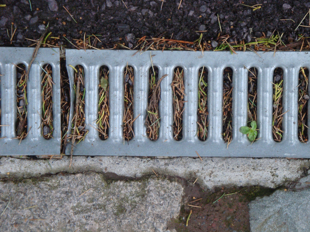 How Do You Clean Out a Trench Drain Without Damaging It?