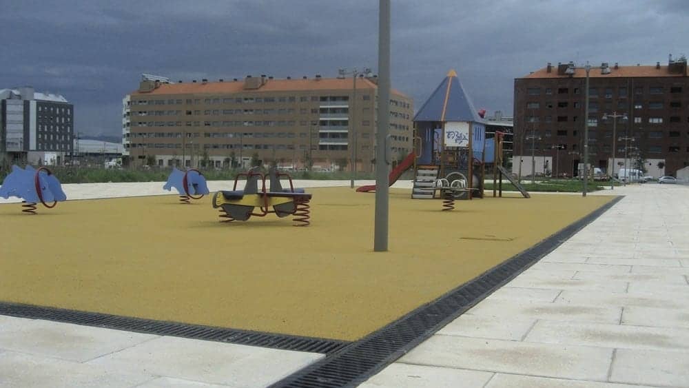 ULMA SELF outline playground with drains | TDS- Trench Drain Systems